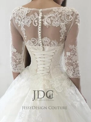 Lujoso Vestido de Novia de Encaje Vestido de Novia Corsé Perlas Botones Catedral Tren Foto 1 de 4