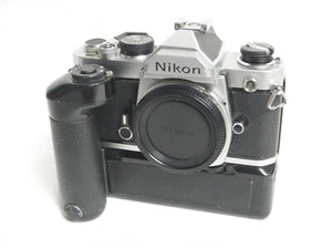 Nikon FM + Nikon MD12 Silver Film Camera Perfectly Working Excellent + Boby Cap - Foto 1 di 15