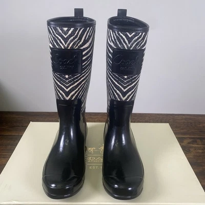 Botas de lluvia altas Coach para mujer Pearl Legacy con estampado de cebra negras/blancas talla 10M Foto 1 de 4