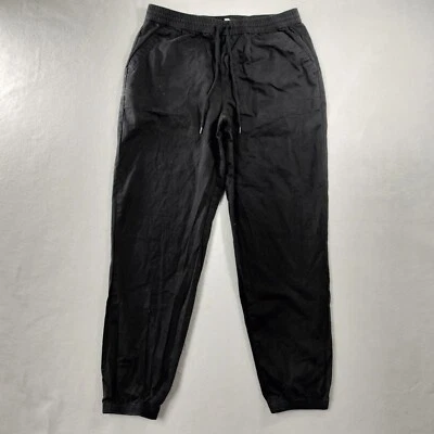 Pantalones de chándal Vans elásticos con cordón negro caqui para hombre talla mediana Foto 1 de 4