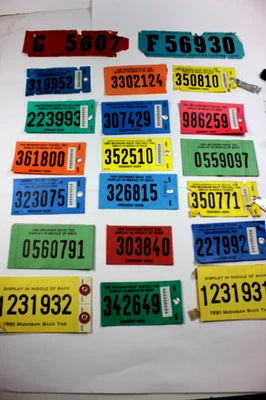 Lote de veinte (20) licencias de caza de residentes de Michigan etiquetas traseras 1960-1990 Foto 1 de 4