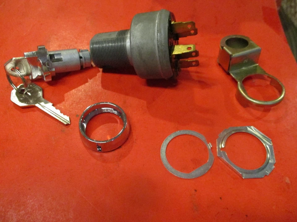 CHEVROLET C/K-10-20-30-GMC 1961-66/ IMPALA 61-63 Ignition SWITCH KEY-BEZEL= - Image 1 of 4