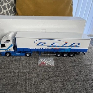 ELIGOR VOLVO FH RESTYLE TAUTLINER REID TRANSPORT Blue 1:43 112457 Northern Ire - Picture 1 of 7