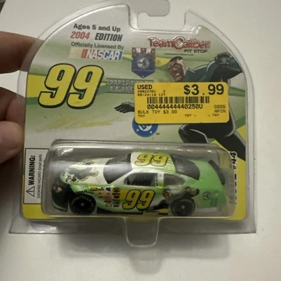 Burton / Edwards #99 JUSTICE LEAGUE  2004 Ford Taurus Team Caliber 1/64 NIB ! - Image 1 of 4