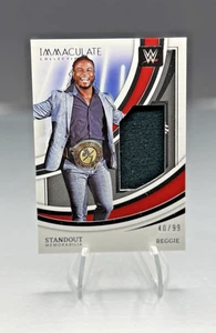 2022 Panini Immaculate WWE Standout Memorabilia /99 Reggie #SM-RGE Short Print - Bild 1 von 3