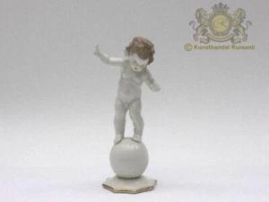 Hutschenreuther Figur Putto auf Kugel farbig bemalt mit Goldrand - Bild 1 von 1