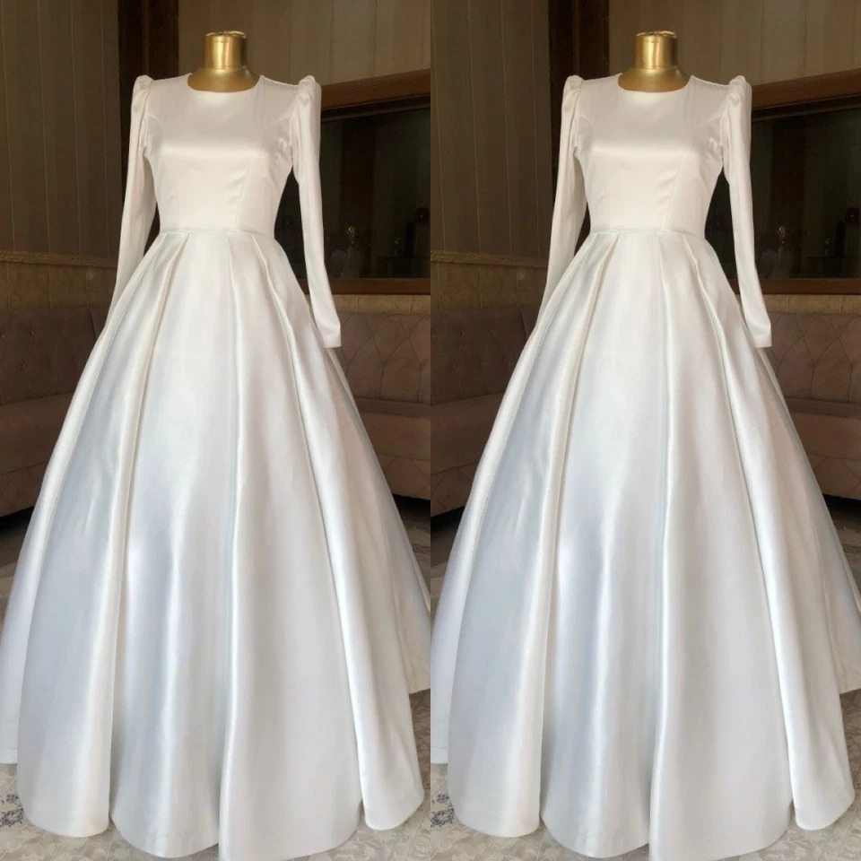 Vestidos de novia mangas largas cuello redondo musulmanes simples satén línea A vestidos de novia Foto 1 de 4