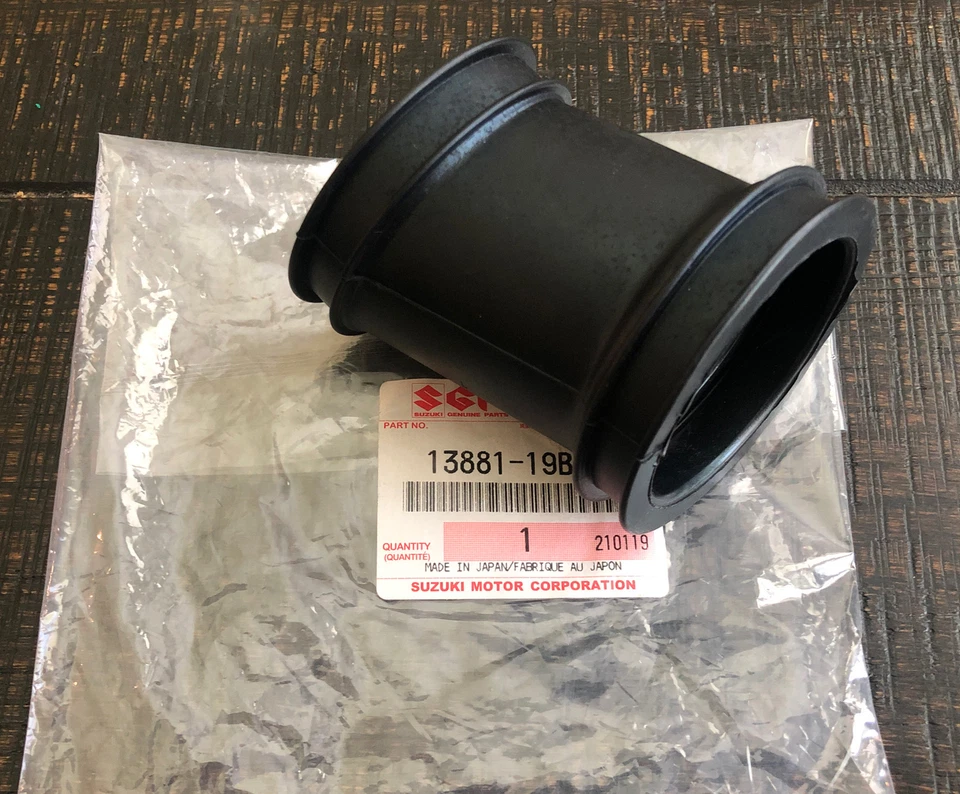 SUZUKI KING QUAD 300 OEM AIR BOX  CARBURETOR INTAKE BOOT 1991-2002, 13881-19B81 - Image 1 of 2