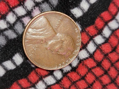 1946 wheat penny for sale non circulated mint condition never been cleaned! Cover