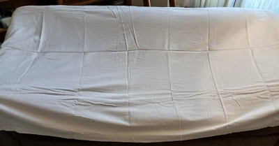 Target white cotton tablecloth 56 by 98 inches (about 6 by 8 feet) - Image 1 of 4
