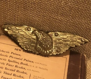 Eagle Detailed Brass Eagle Adornment on Leather 5.5 x 1.5" - Picture 1 of 5