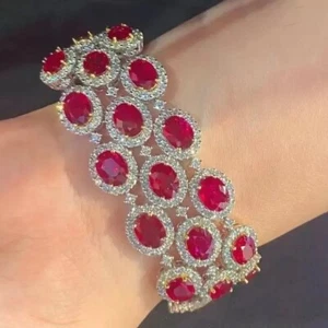 Bracciale dichiarazione 56 ctw taglio ovale creato rubino e diamanti placcato oro giallo 14 kt - Foto 1 di 8