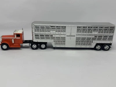 New Ray Orange 1949 Peterbilt Model 380 Semi Truck Livestock Bull Hauler 1:43 - Image 1 of 4