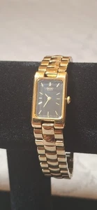Seiko Tank Uhr Damen 18mm schwarzes Zifferblatt goldfarben rechteckig 1F20-5020  - Bild 1 von 11