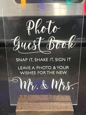 Letrero de libro de invitados de boda  Foto 1 de 2