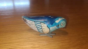 Pick-Vogel Blechspielzeug mit Mechanik "Bluebird Made in China" - Bild 1 von 5