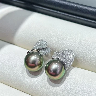 Impresionante par de pendientes de perlas verdes negras redondas tahitianas 925s (Tim) de 10-11 mm Foto 1 de 3