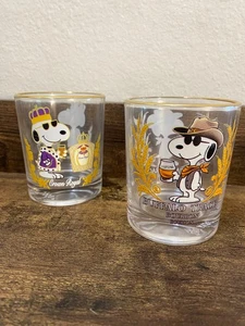 🃏 RARE Snoopy Whiskey Glasses Set of 2 – Crown Royal & Buffalo Trace 🥃✨ - Picture 1 of 3