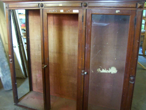 Walnut and glass showcase Cover