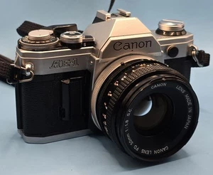 Canon AE-1 SLR Film Camera with FD 50mm F/1.8 S.C. Lens- New Batteries Included - Picture 1 of 12