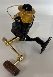Mitchell 308 X Gold Spinnrolle 10 Bearing Drive schwarz/gold 6LB 160 YD - Bild 1 von 10