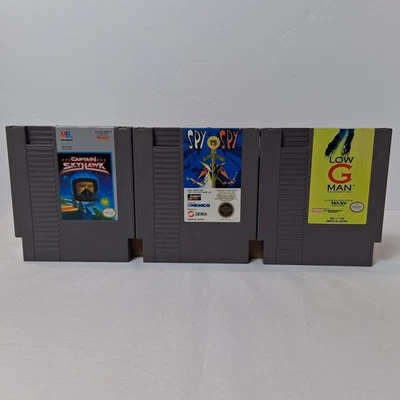 Nintendo NES Authentic Game Lot Of 3 Spy vs Spy Captain Skyhawk Low G Man Tested - Image 1 of 4