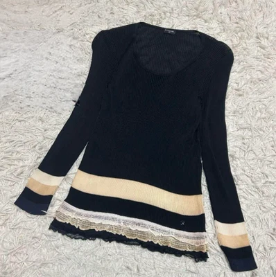 CHANEL, suéter de punto acanalado, volantes, marca Coco, color bicolor, manga larga Foto 1 de 4