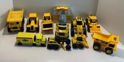 11 Piece Plastic Toy Trucks, Loaders, Cat & Dog & RX05 Construction Equipment. - Image 1 of 4