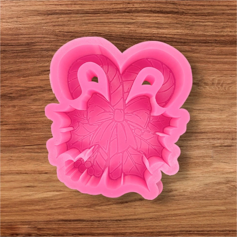 Bastones de caramelo cruzados con molde Bow Freshie! Foto 1 de 1