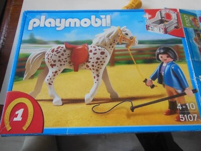 Boite PLAYMOBIL N° 5107 : manege de chevaux avec monitrice - Photo 1/3