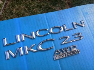 Lincoln MKC 2.3 AWD Eco Boost chrome Lettering 2015-2017 rear Emblem OEM USED  - Picture 1 of 6