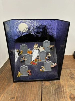 Disney Halloween Cemetery Pin Set Ltd, Complete w/ 13  Pins & Tombstone Display - Image 1 of 4