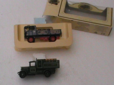 lot de 2 camions DAYS GONE/LLEDO PLC MAC MULLENS ET D6 20 IN COUPE .PLATEAU AVEC - Photo 1/4