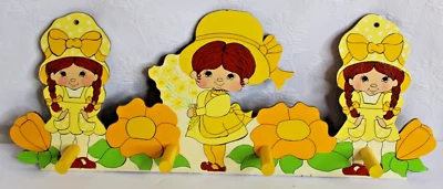 Vintage Wooden Wall Hanging Coat Hook Pegs Girls In Yellow 1975 - 21.5" Long - Image 1 of 4