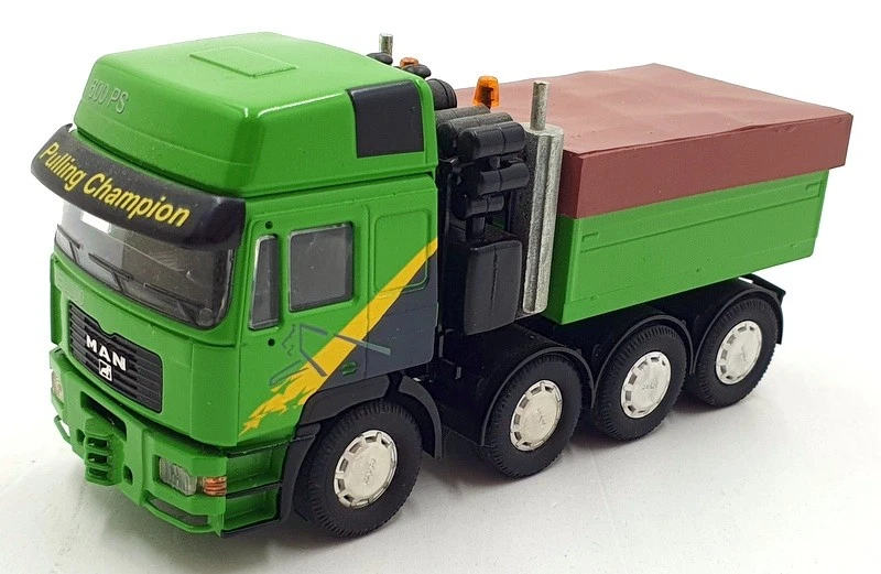 Conrad 1/50 Scale 6101/02 - MAN E2000 Schwerlastzugmasch Pulling Champion - Image 1 of 4