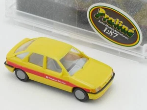Praliné 5702 Ford Escort gelb Telekom Modellauto 1:87 WIE NEU! OVP 1610-29-45 - Picture 1 of 3