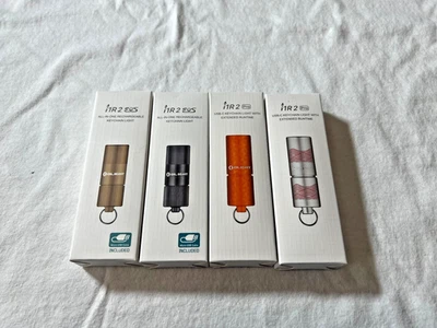 Olight Lot  I1R 2 EOS Desert Tan, black. i1R 2 Pro Orange, Flow. - Image 1 of 2