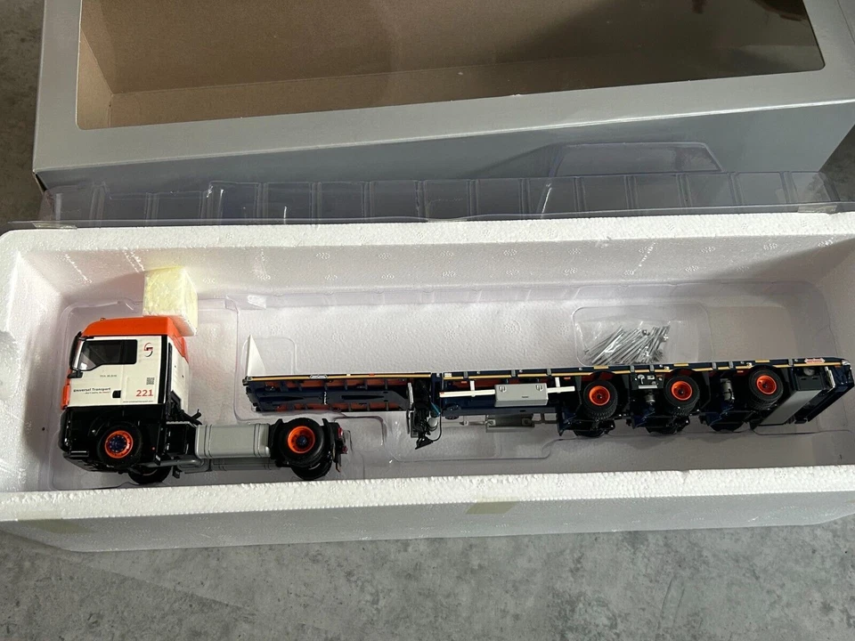 WSI 1:50 Universal Transport MAN TGX XLX + megatrailer a 3 assi - Immagine 1 di 1