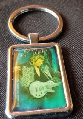 Johnny Hallyday en concert, a la guitare- Ancien Porte clé -Fan Avenue - Photo 1/2