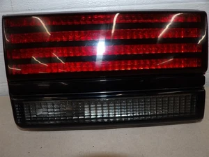 RH PASSENGER SIDE TAILLIGHT LAMP PONTIAC SUNBIRD 1988-1994 2Dr trunk lid mounted - Bild 1 von 3