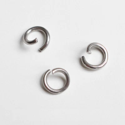 Ø 5x0,8  und 6x0,8 mm Edelstahl offene Binderinge Biegeringe Ösen für Ketten - Bild 1 von 2