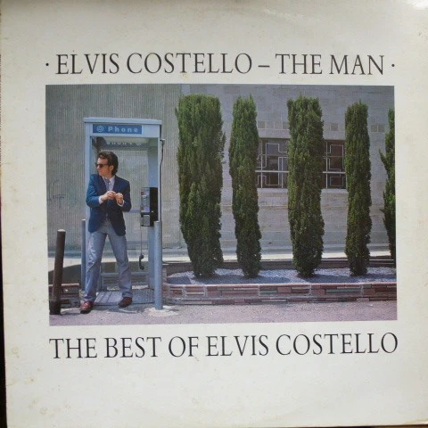 Elvis Costello - Man The Best Of  - Used Vinyl Record - W7294z - Image 1 of 1