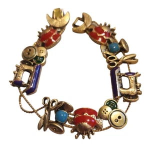 Pulsera Deslizante Dije 7.5" Tono Dorado Cepillado Estilo Tofa Costura Tema Regalo - Imagen 1 de 8