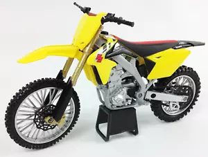 Modellino bici giocattolo Newray SUZUKI RMZ 450 1:6 pressofuso motocross MX GIALLO - Foto 1 di 5