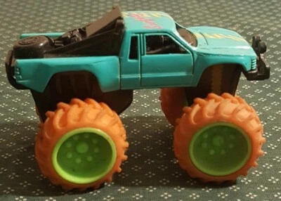 Monster Truck M.C Toy Maisto 1/64 Toyota SR5 Surfway 4x4 DIECAST TODOTERRENO carreras Foto 1 de 4