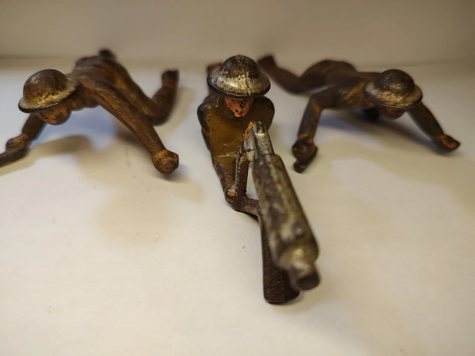 Lote 3 ametralladoras y lanzadores de bombas de hierro gris Foto 1 de 3