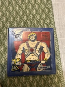 VTG 1983 Mattel He Man Slide Puzzle ~ Hand Held  Party Favor In Original Pastic - Picture 1 of 3