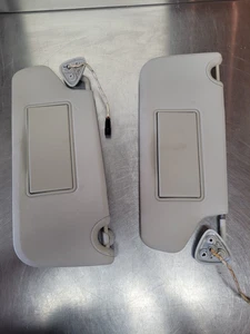 2011-2020 Dodge Journey Front Left & Right Illuminated Sun Visor Beige OEM Pair - Picture 1 of 16