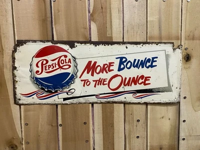 Letrero metálico horizontal vintage de Pepsi Cola More Bounce to the Ounce 48" x 18" Foto 1 de 4
