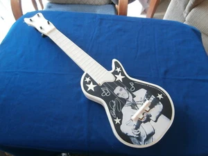 ELVIS PRESLEY~GUITARRA DE JUGUETE~1984~EXCELENTE ESTADO ~ RARA~ COLECCIONABLE - Imagen 1 de 4